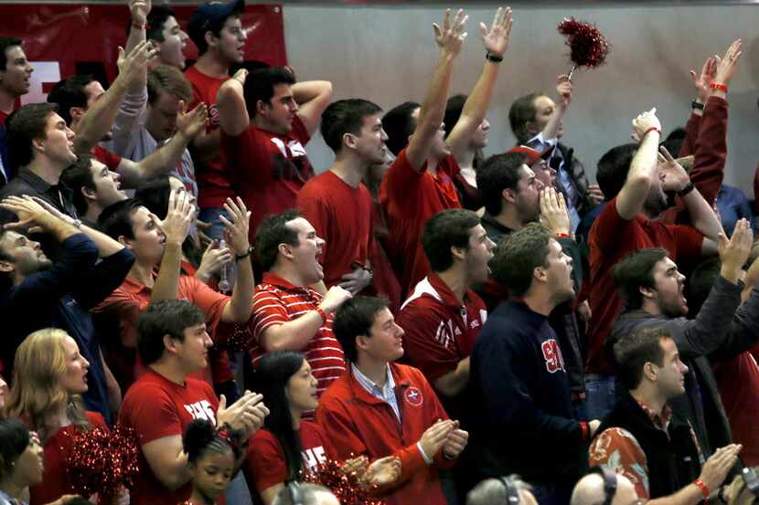 Fans react after SMU scores during the second half of the SMU vs. Connecticut basketball...