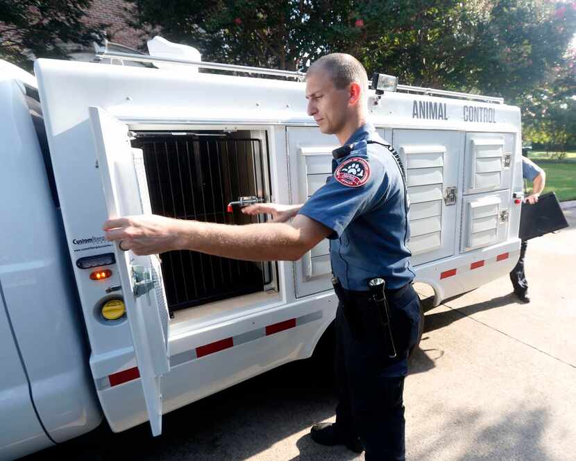 
Wies opens the back of the new animal control truck for Addison Animal Control. The truck...