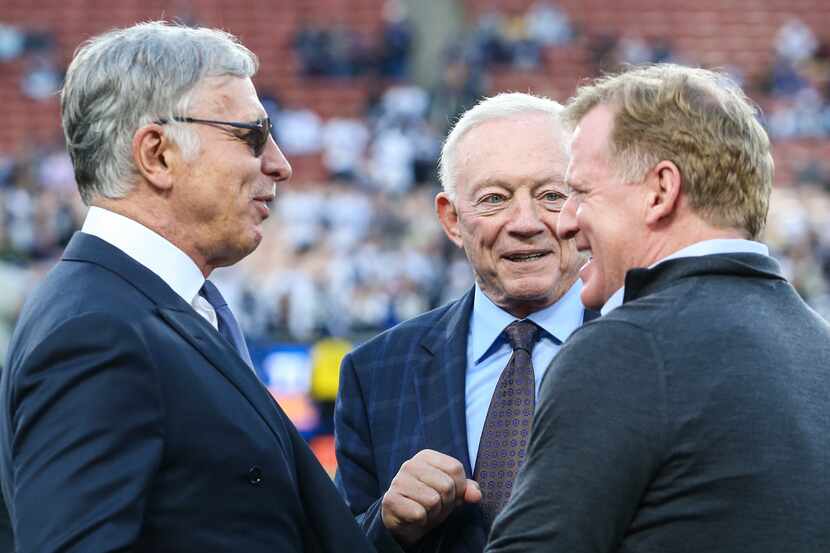 Los Angeles Rams owner Stan Kroenke, left, Dallas Cowboys owner Jerry Jones and NFL...