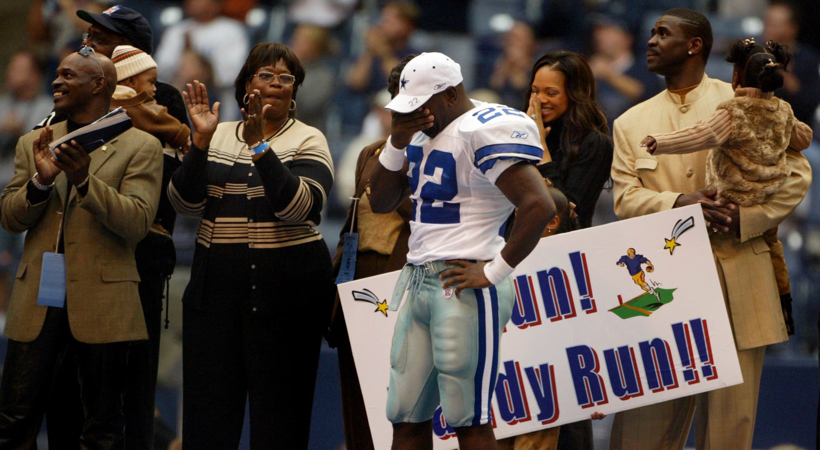 Dallas Cowboys running back Emmitt Smith (22) tries to hide emotion during a post-game...