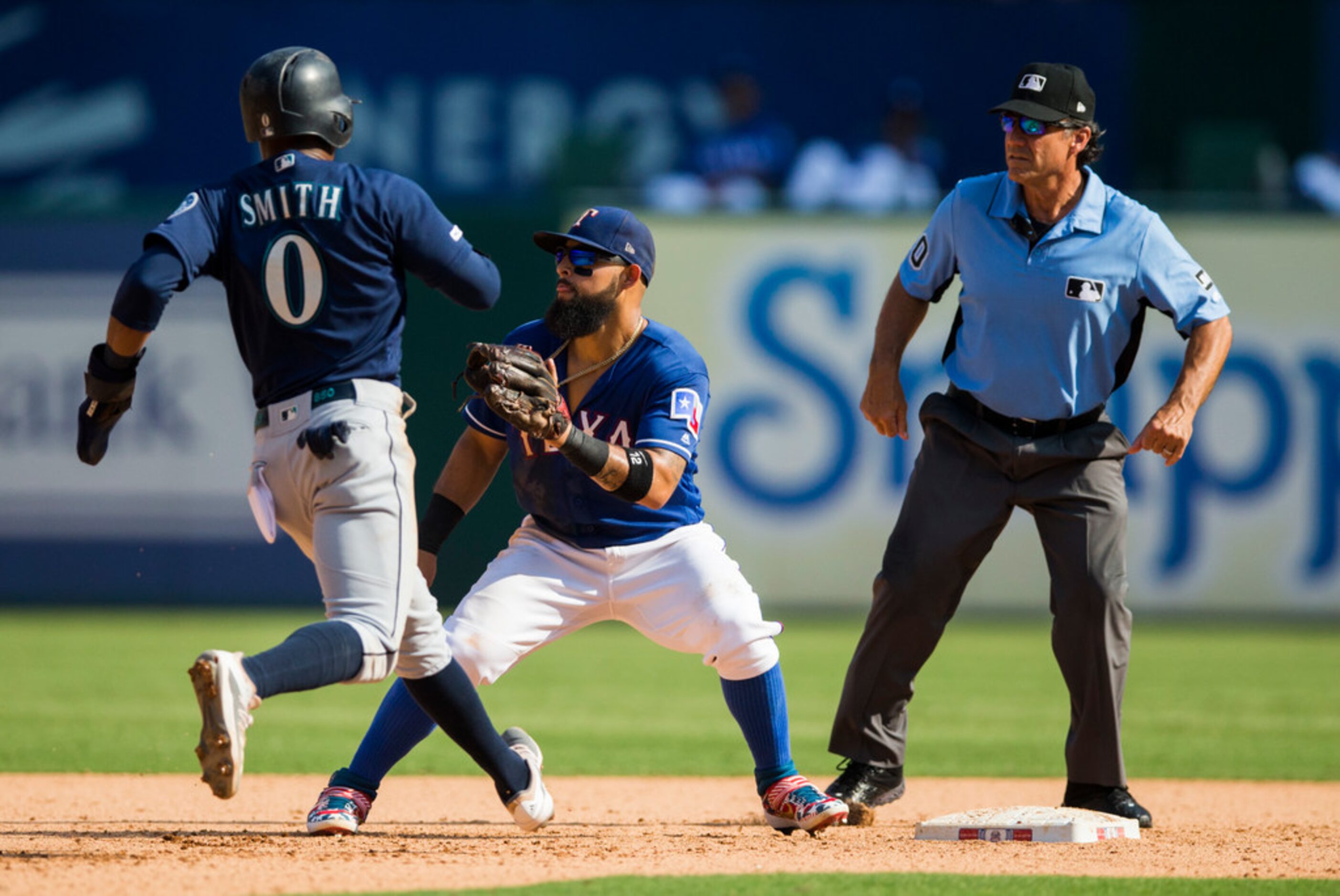 Texas Rangers second baseman Rougned Odor (12) looks for a throw to second as Seattle...