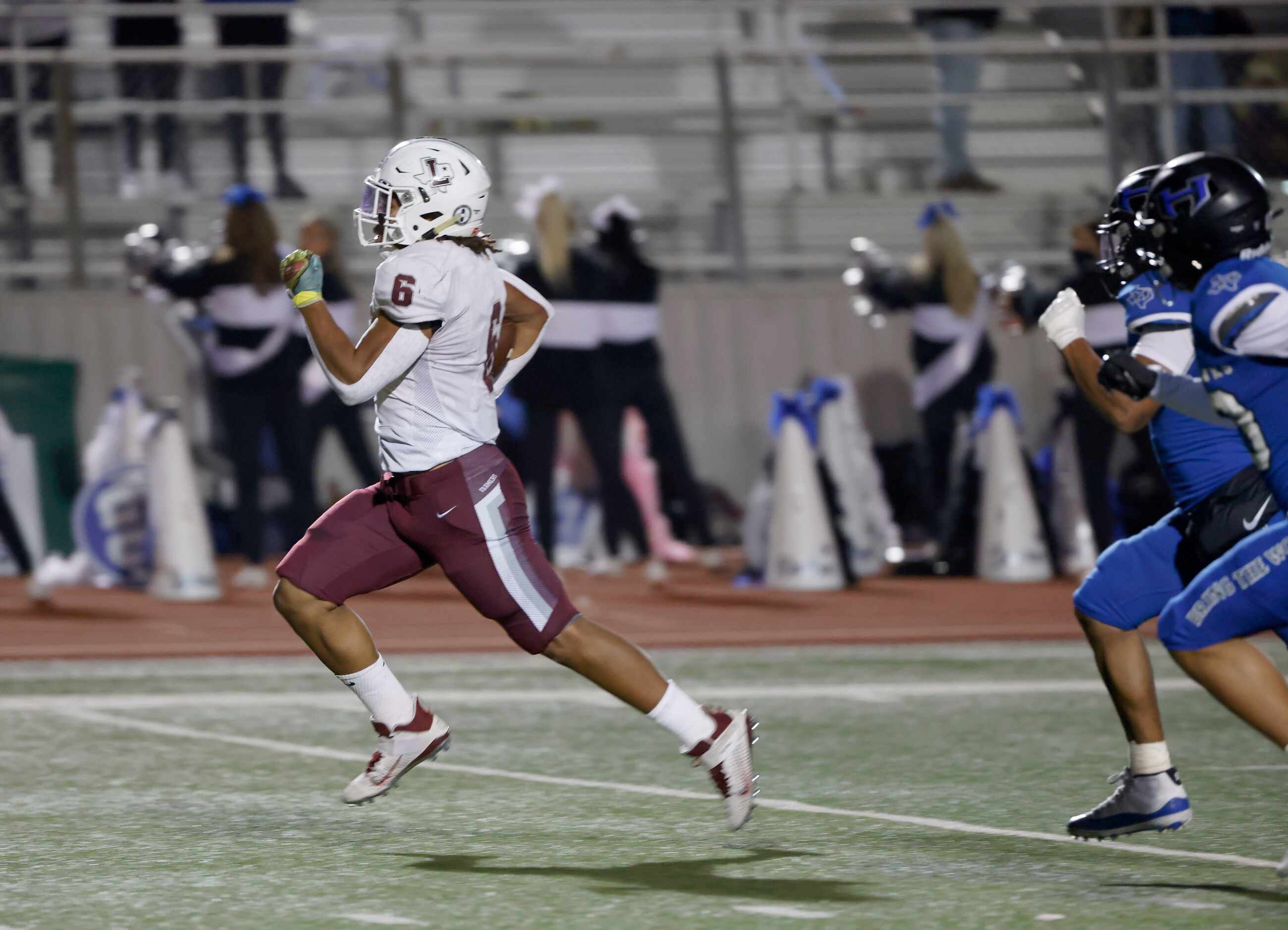 Lewisville running back Damien Martinez (6) runs for a long touchdown against Hebron during...