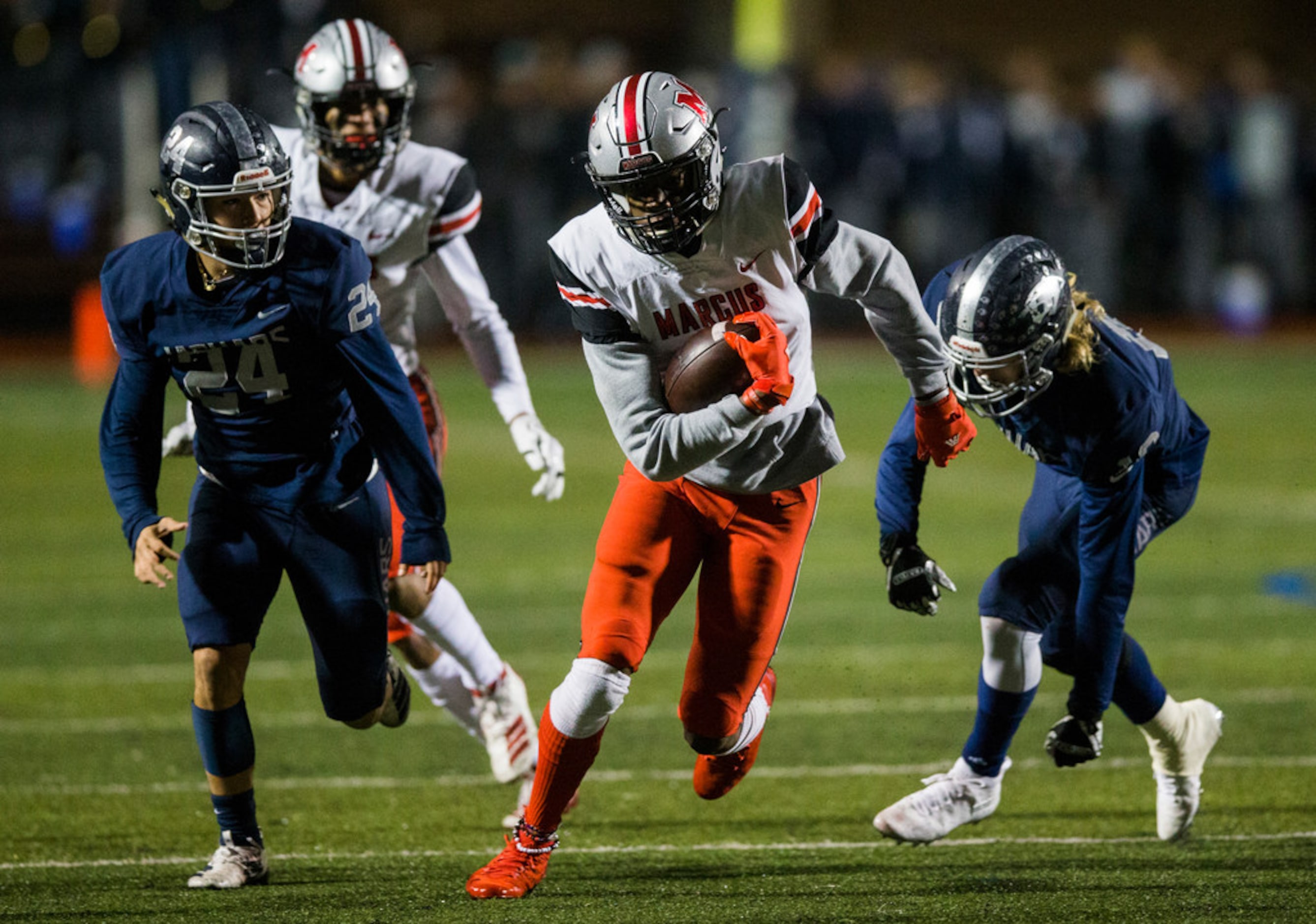 Flower Mound Marcus wide receiver J. Michael Sturdivant (7) runs the ball during the first...