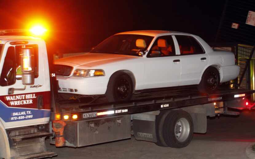 Authorities removed a Ford Crown Victoria after conducting a search of a storage unit in...