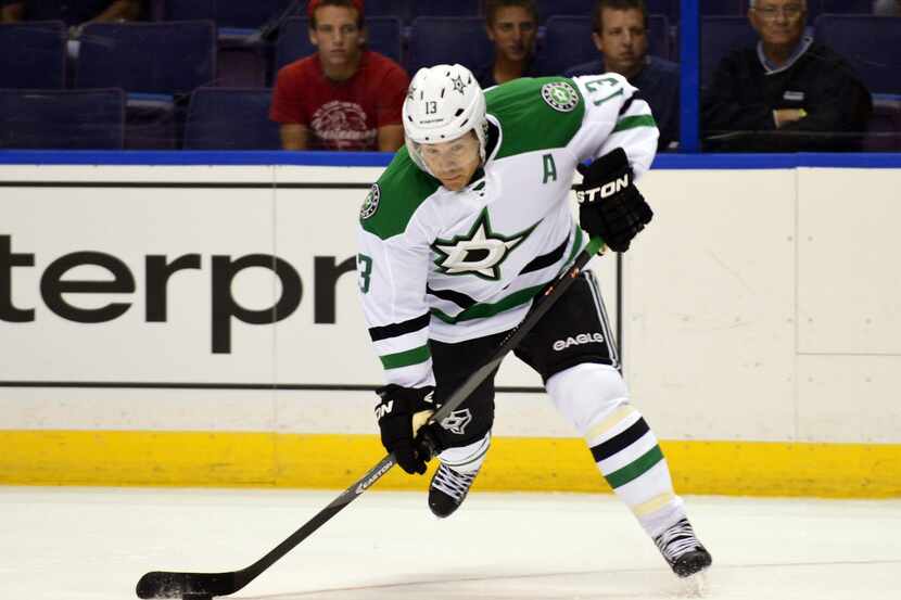 Sep 21, 2013; St. Louis, MO, USA; Dallas Stars left wing Ray Whitney (13) takes a shot...