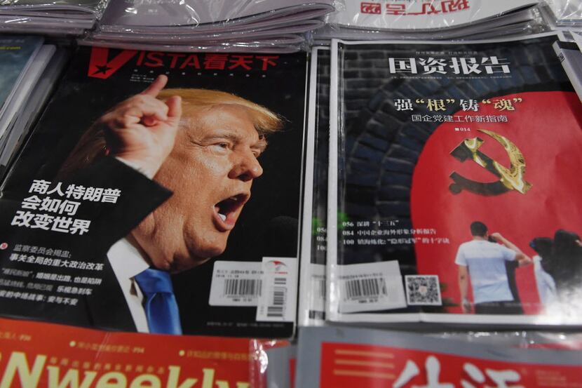 A magazine featuring US President-elect Donald Trump is seen at a bookstore in Beijing on...