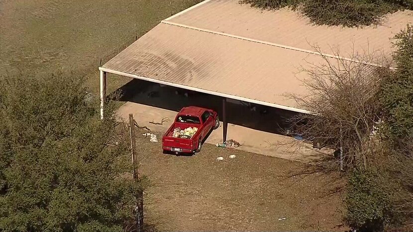 An aerial photo shows the home where officials say Wise County Sheriff's deputies found four...