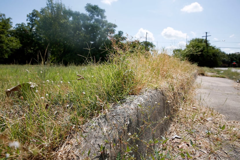 The 2600 block of Merlin Street, in the old Jeffries-Meyers neighborhood in Fair Park, looks...