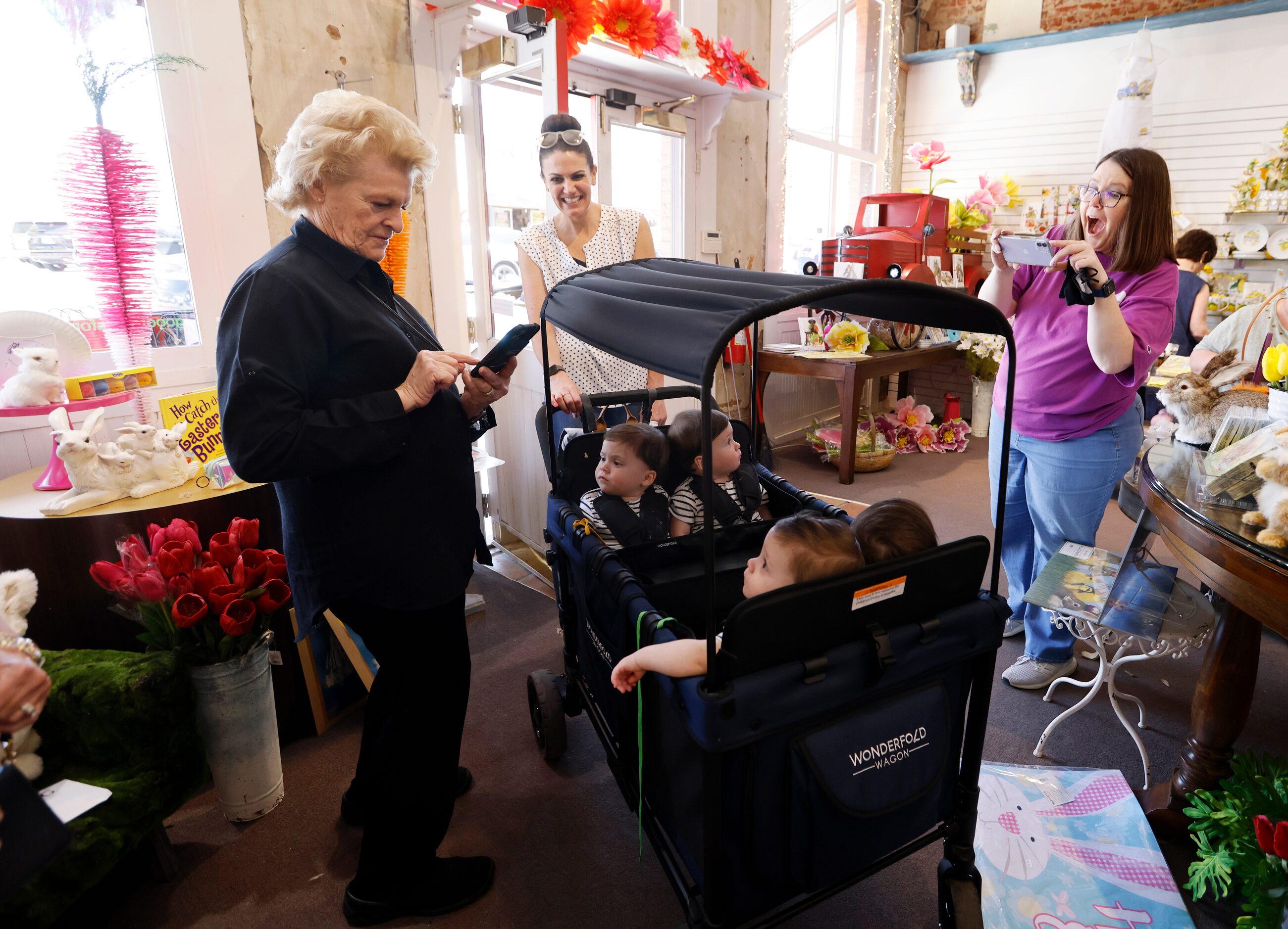 Sally Bultmann (far left), owner of the store Good Things for All Seasons and Leslie Cave...