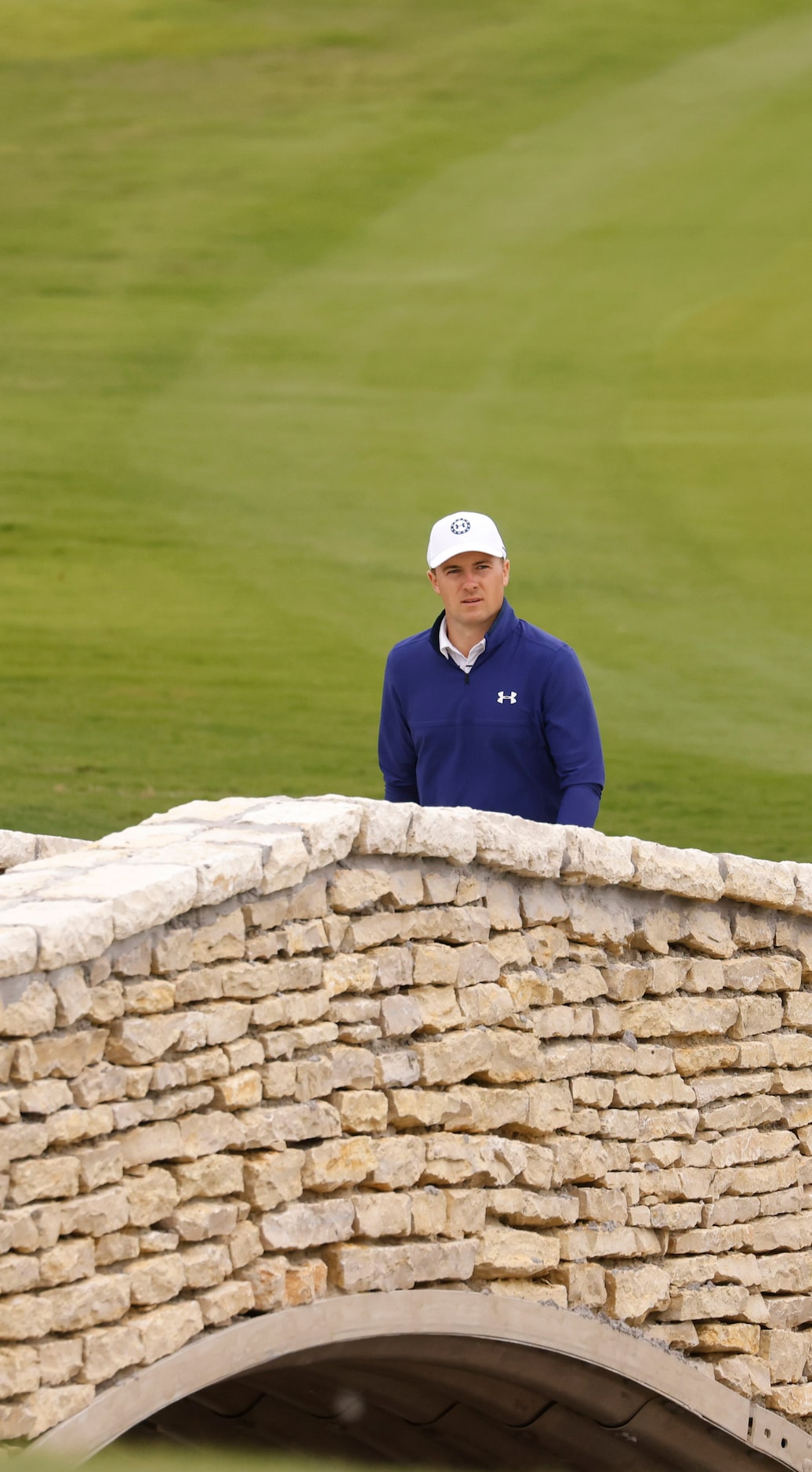 Jordan Spieth makes his way to the green on the 18th hole during round 2 of the AT&T Byron...