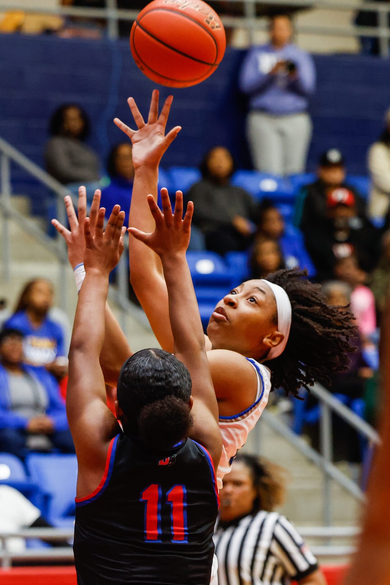 Conway Lady Cats Chloe Clardy (13) goes for a shot against Duncanville Pantherettes' Tristen...