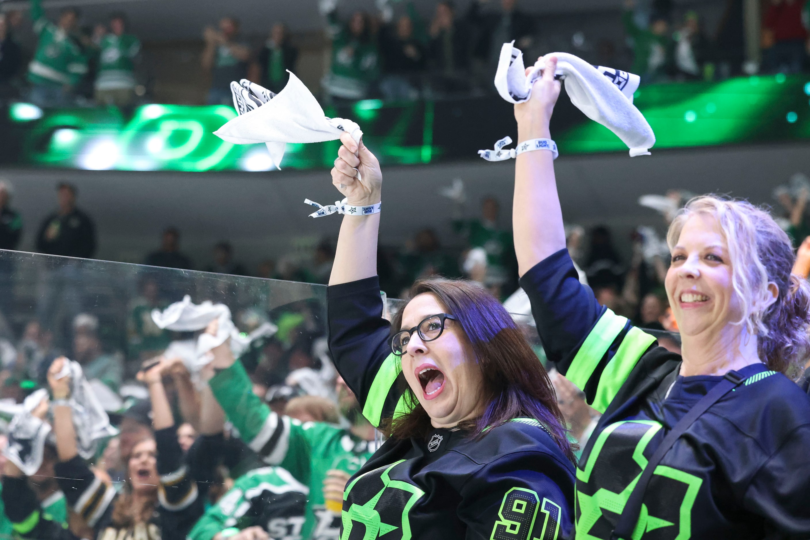 Dallas fans cheer after the team’s second goal during the second period in Game 2 of an NHL...