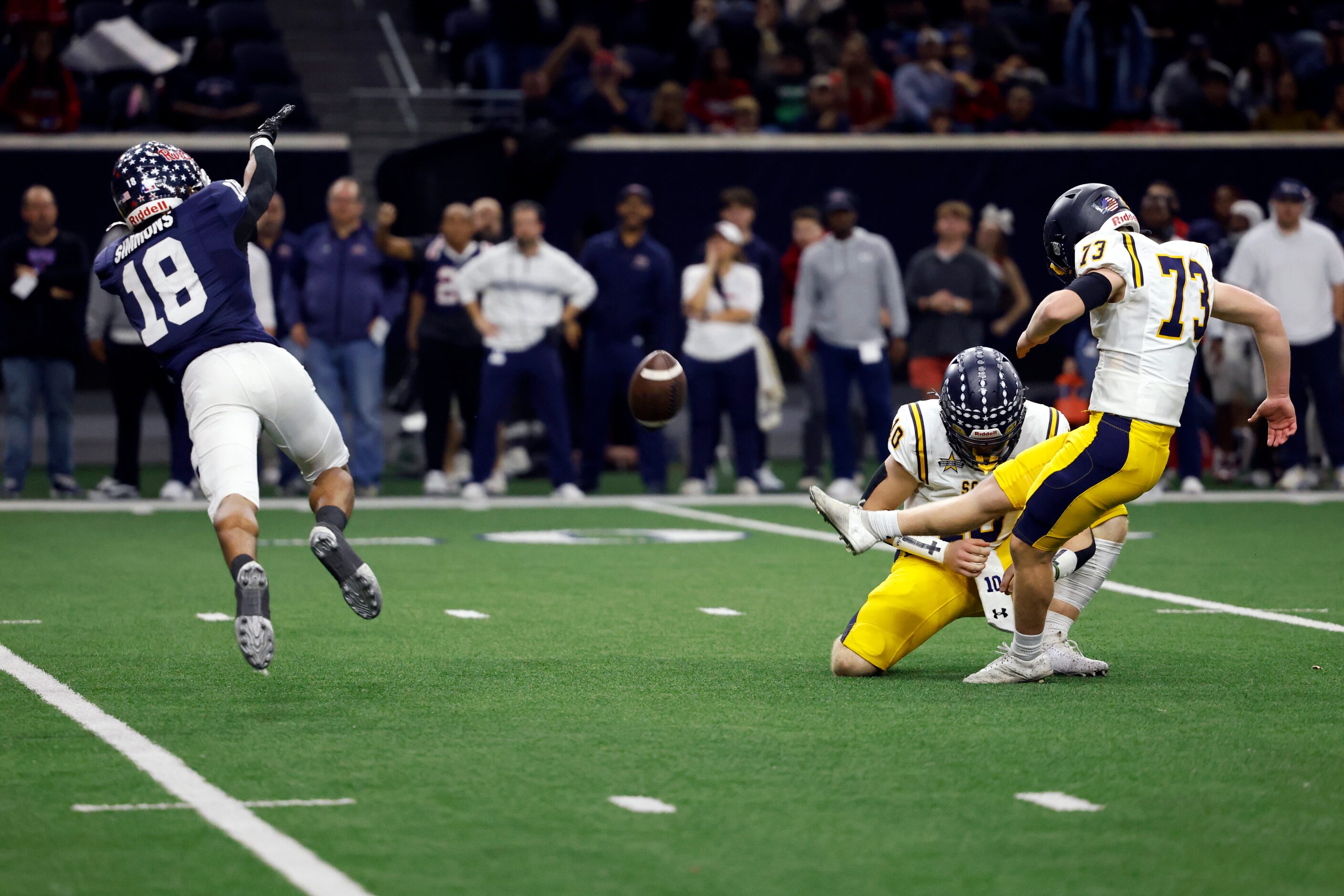 Highland Park kicker Sutton Stock (73) kicks the game-winning field goal with six seconds...