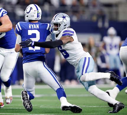 Dallas Cowboys safety Donovan Wilson (6) sacks Indianapolis Colts quarterback Matt Ryan (2)...