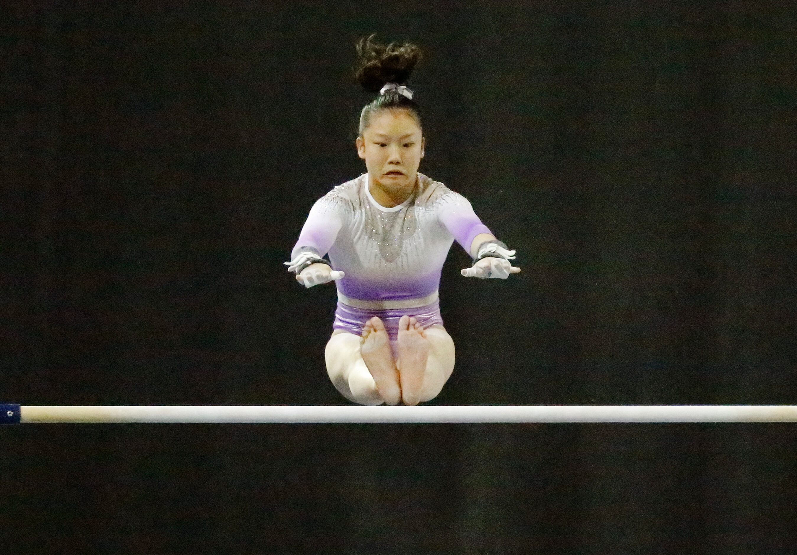 Datelyn Jong with Metroplex Gymnastics performs on th uneven bars during the USA Gymnastics...