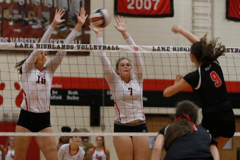 Lake Highlands' Lauren Crabtree (9) shoots into the defense of Coppell's Riley Ross (16) and...
