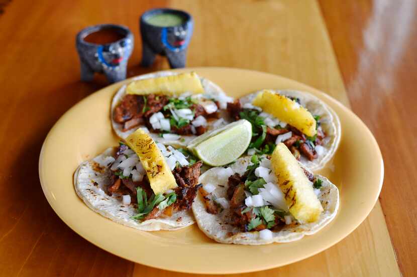 Tacos of pastor and pineapple from El Come Taco on Fitzhugh Avenue.