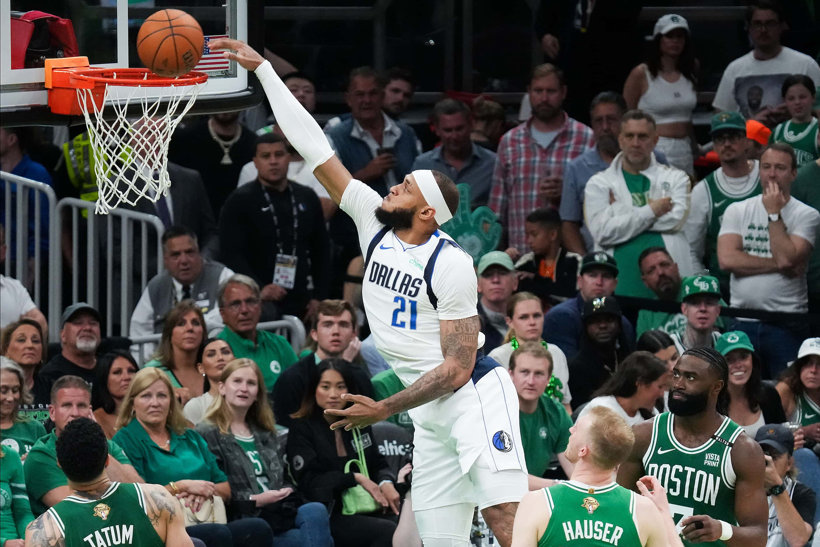Dallas Mavericks center Daniel Gafford (21) goes up for a dunk during the first half in Game...