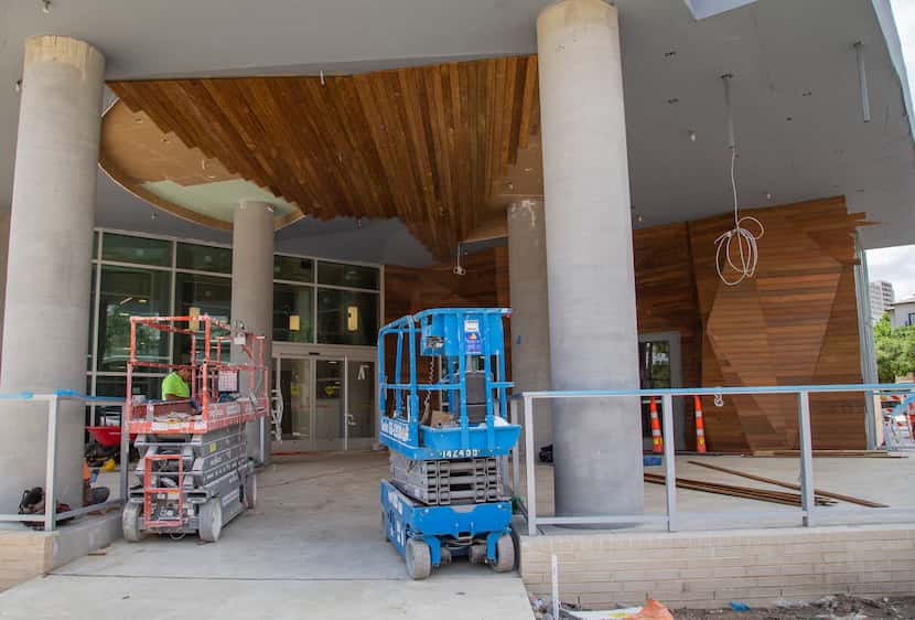 Work on the entrance of the Tom Thumb, which is set to open this fall.