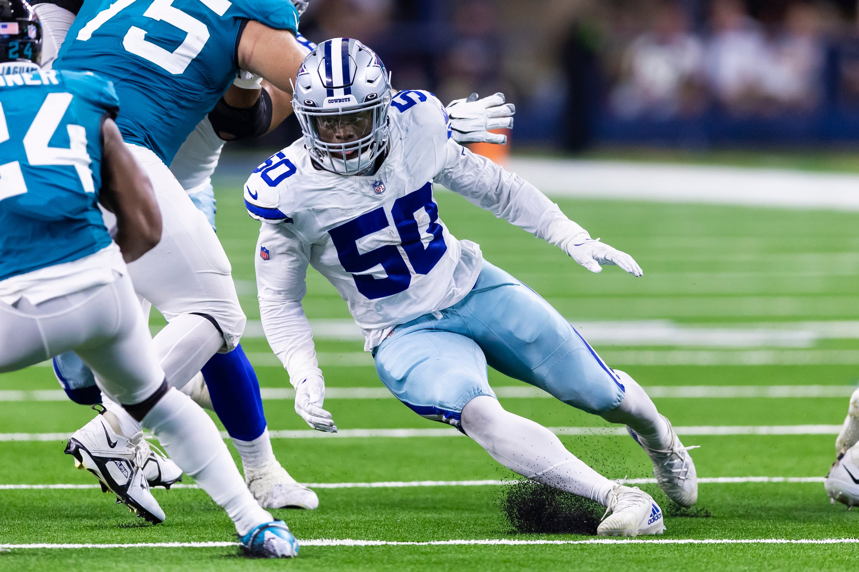 Dallas Cowboys linebacker Isaiah Land (53) is seen during the first half of  an NFL football