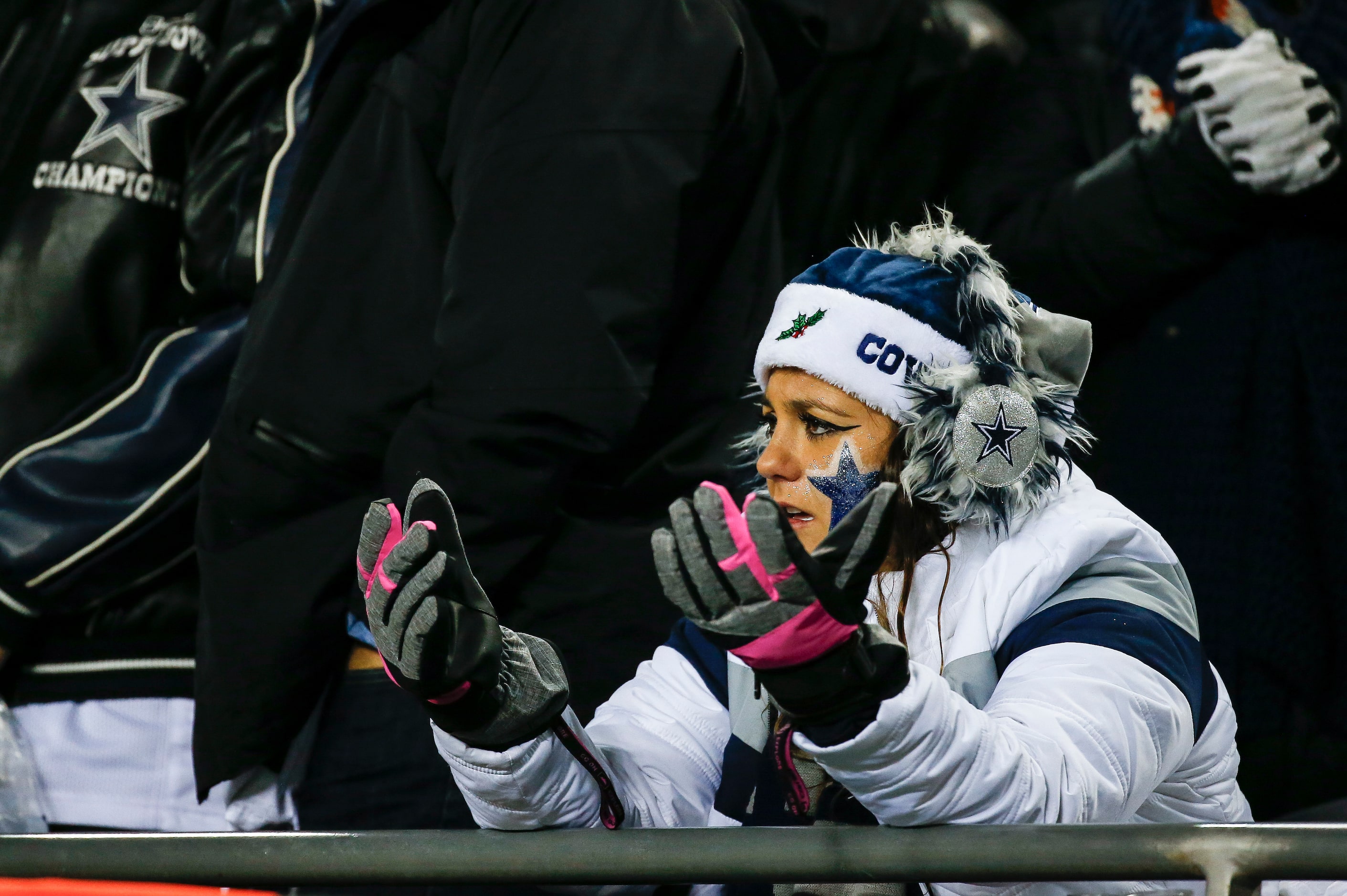 A disappointed Dallas Cowboys fan reacts during the second half a NFL matchup between the...