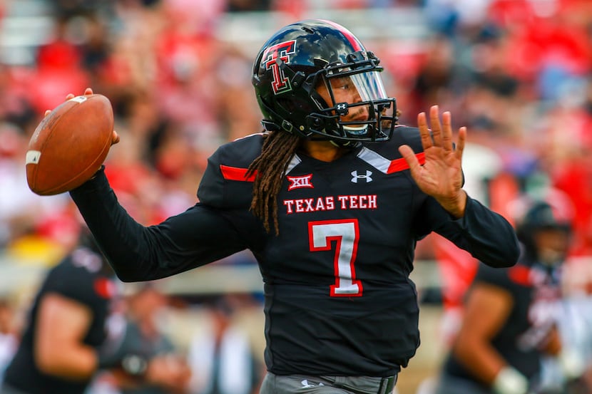 Texas Tech's Jett Duffey (7) passes the ball during an NCAA college football game against...