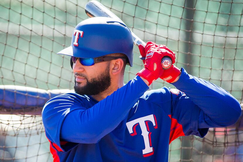 Texas Rangers right fielder Nomar Mazara hits in the batting cage during a spring training...