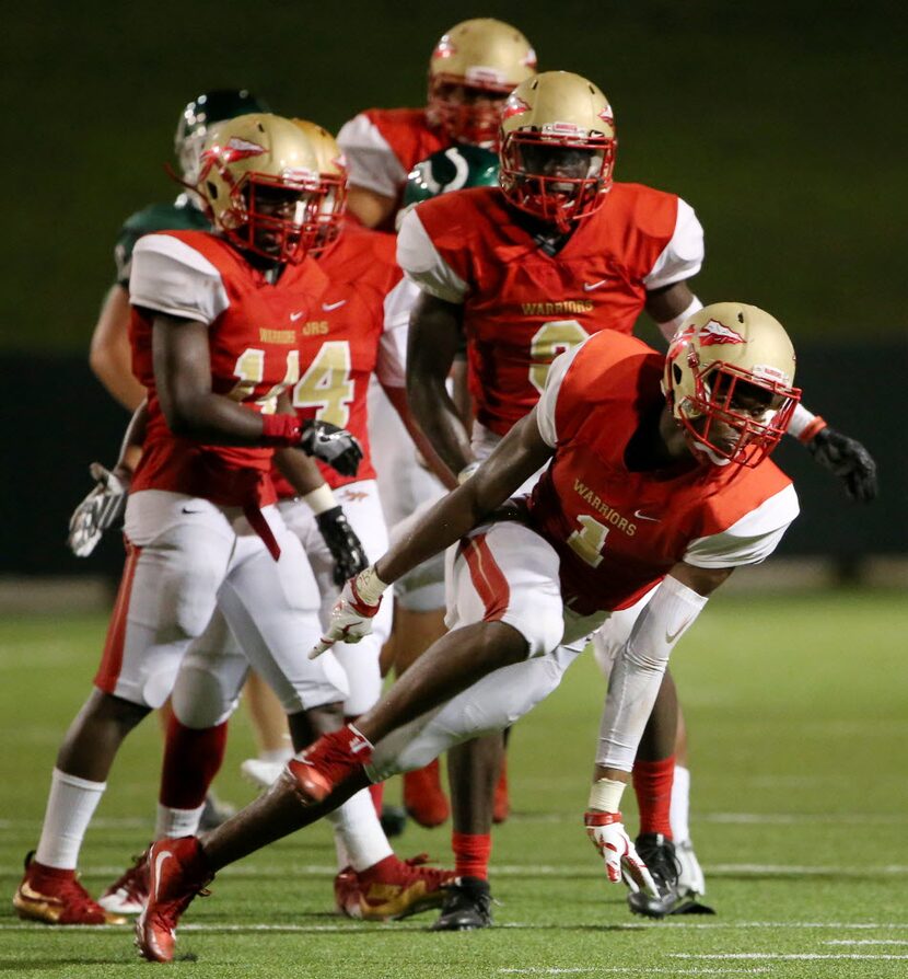 South Grand Prairie defensive back Jeffrey Okudah (1) celebrates after recovering a fumble...