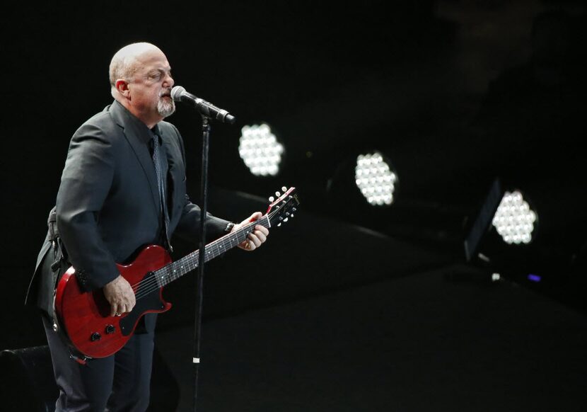 Billy Joel performs during his concert at the American Airlines Center in Dallas on...