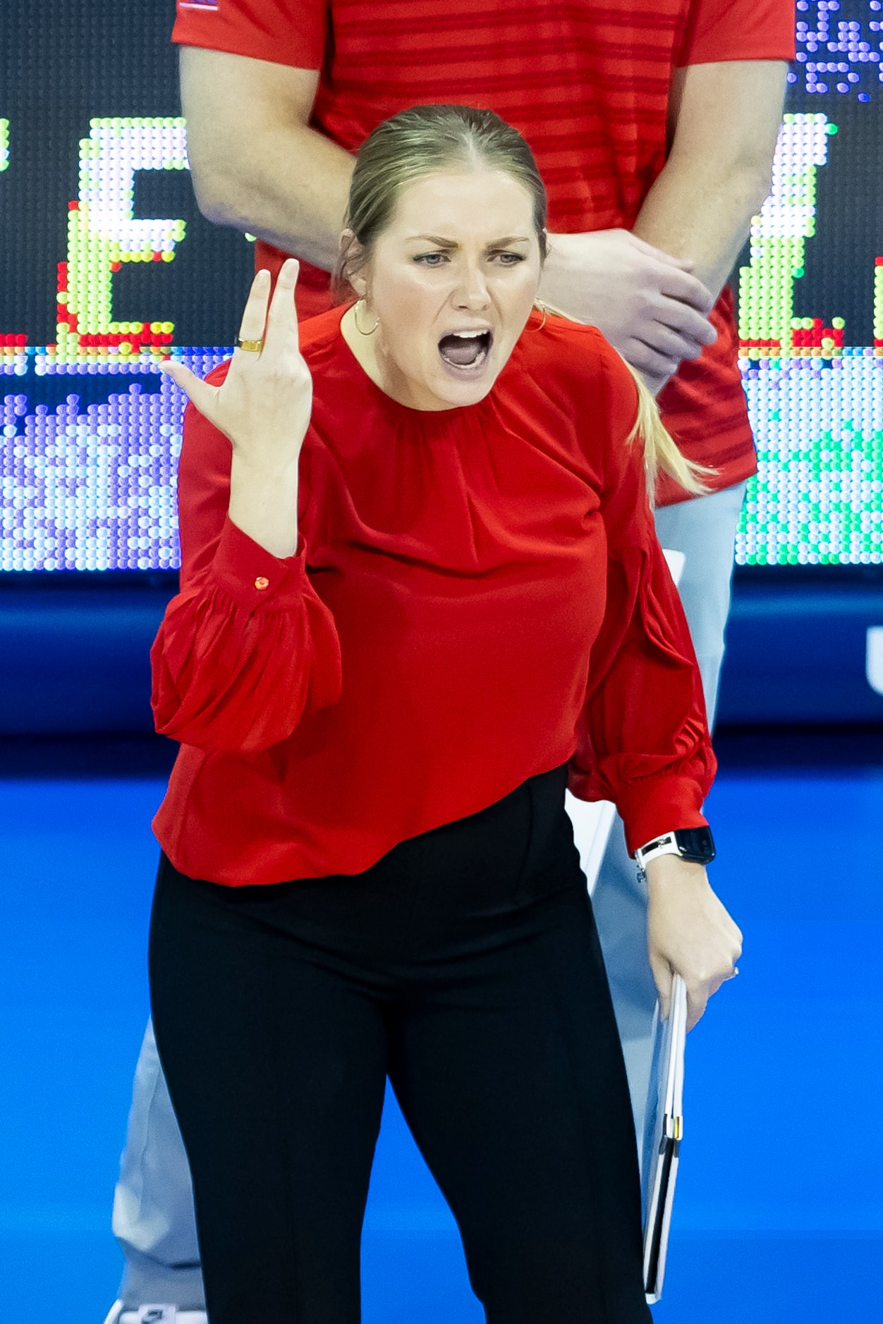 SMU’s head coach Sam Erger shouts instructions to her players during an NCAA college...