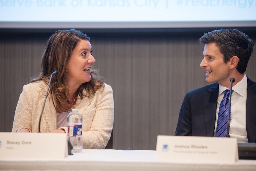 Stacey Dore of Vistra Corp. and Joshua Rhodes, with the University of Texas at Austin during...