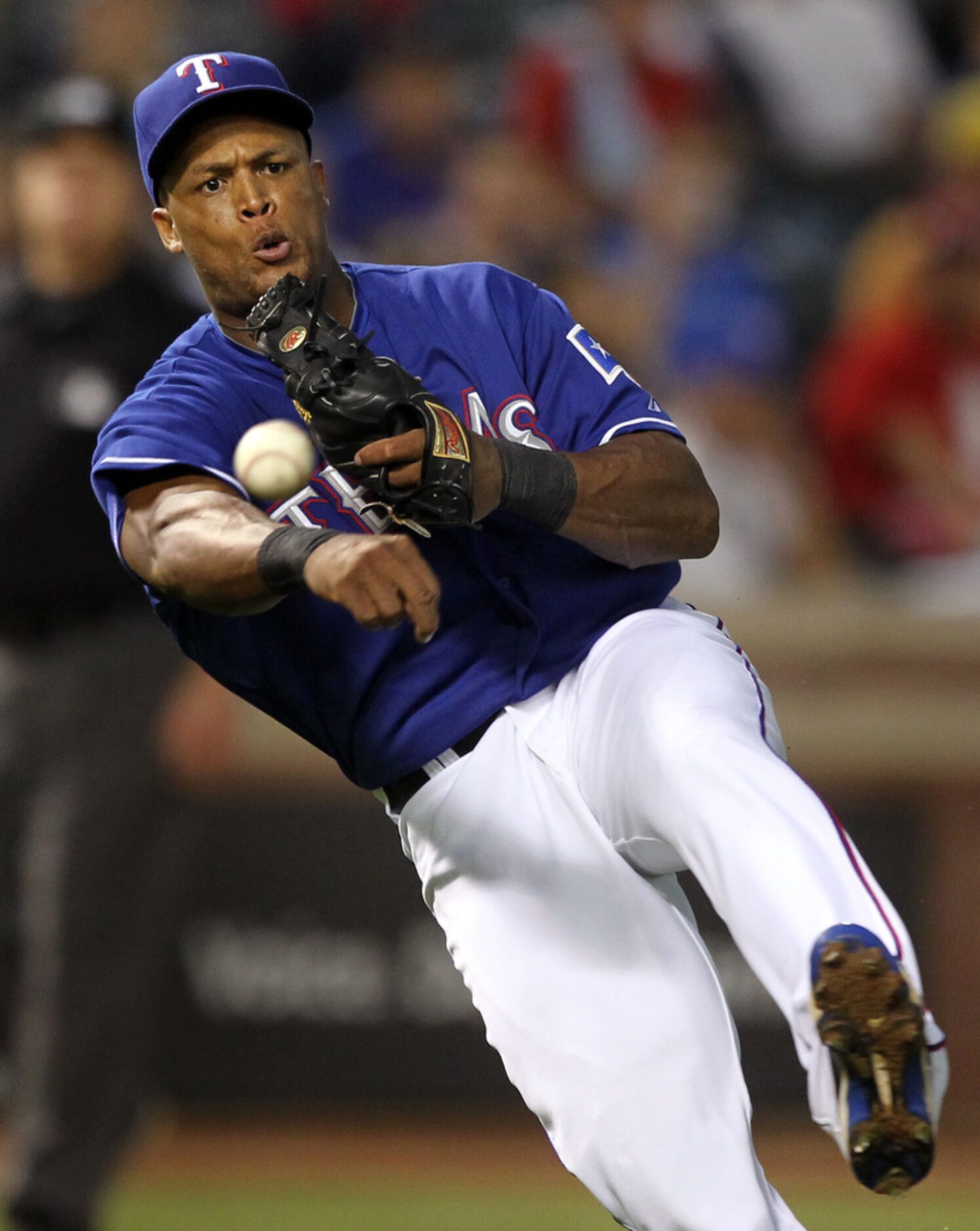 Texas 3B Adrian Beltre throws to first during the Toronto Blue Jays vs. the Texas Rangers...