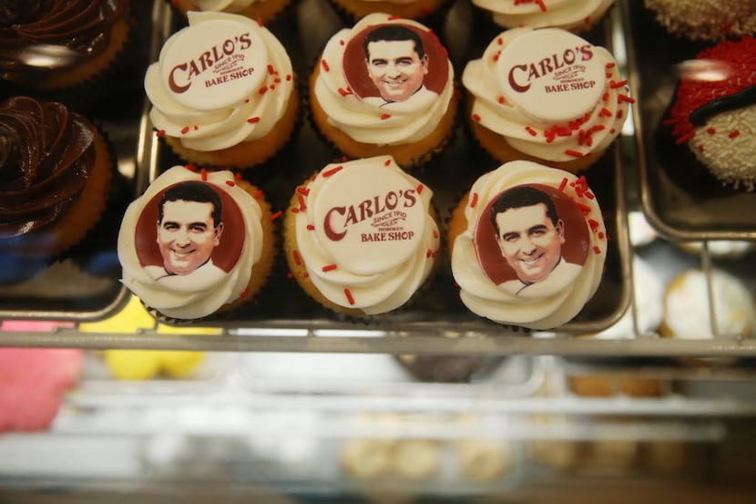 Cupcakes with the likeness of Carlo's Bakery owner and celebrity chef Buddy Valastro sit in...
