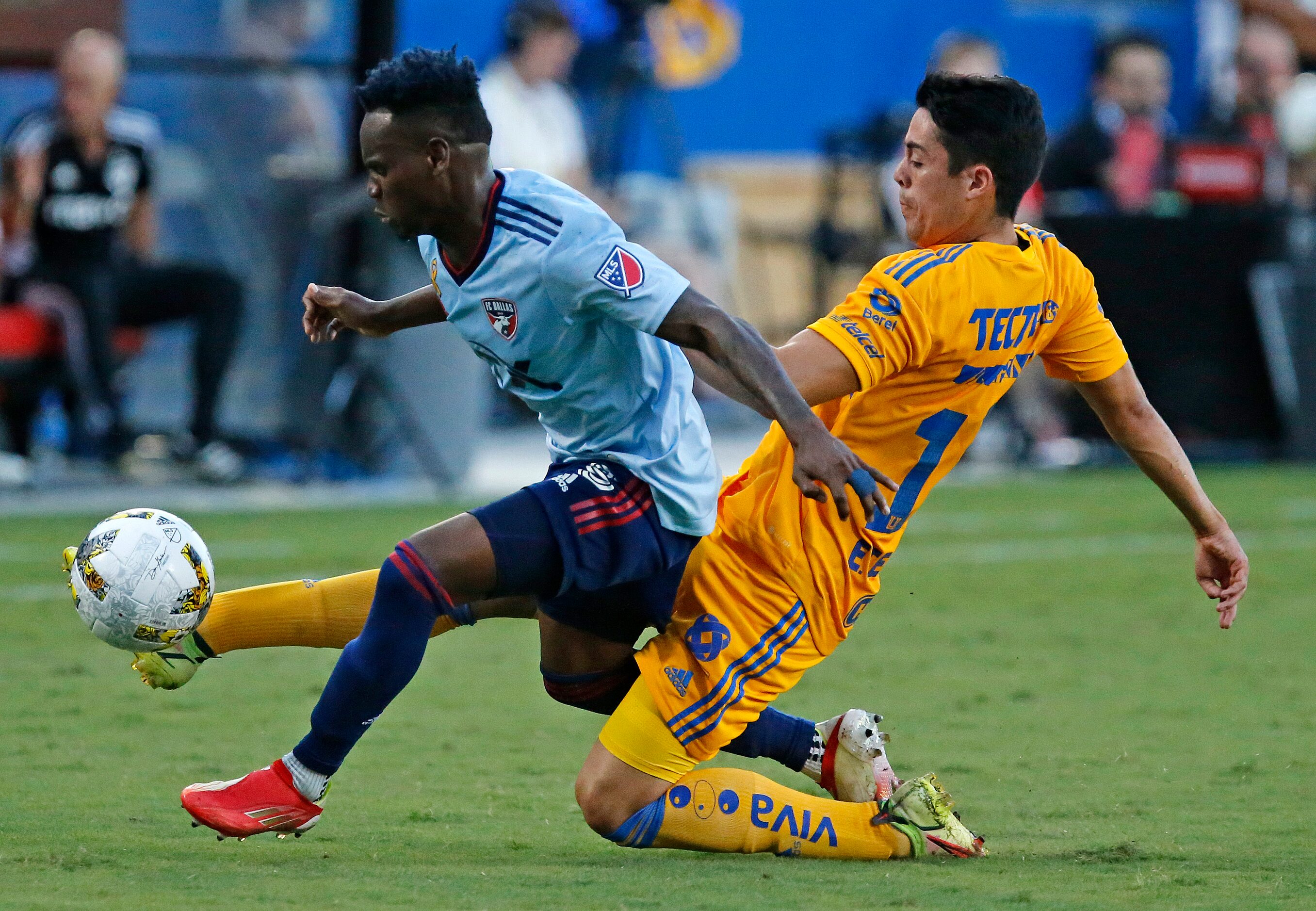 Tigres UNAL defender Eduardo Tercero (15) goes through FC Dallas midfielder Jader Obrian...