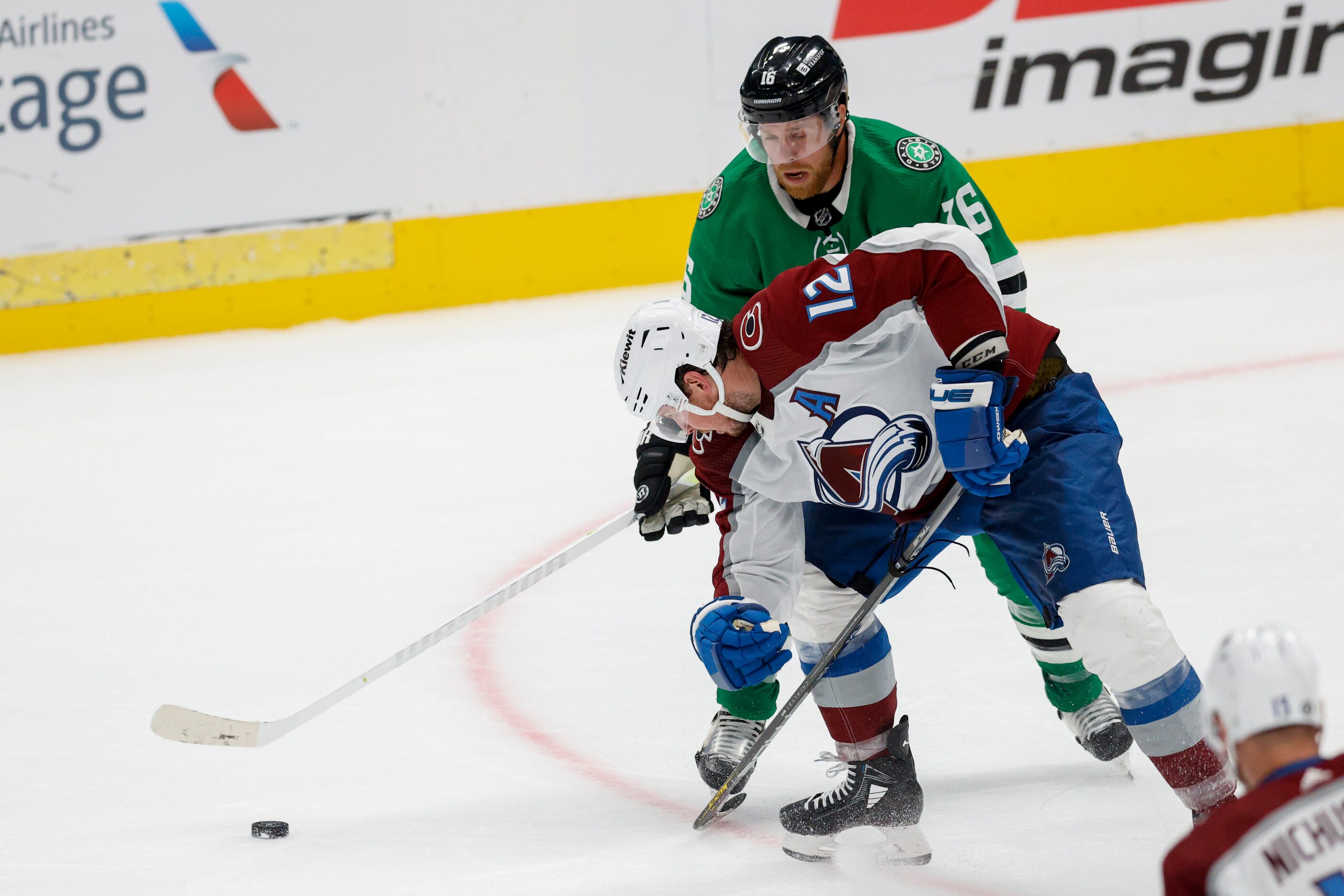 Dallas Stars center Joe Pavelski (16) handles the puck near Colorado Avalanche center Ryan...