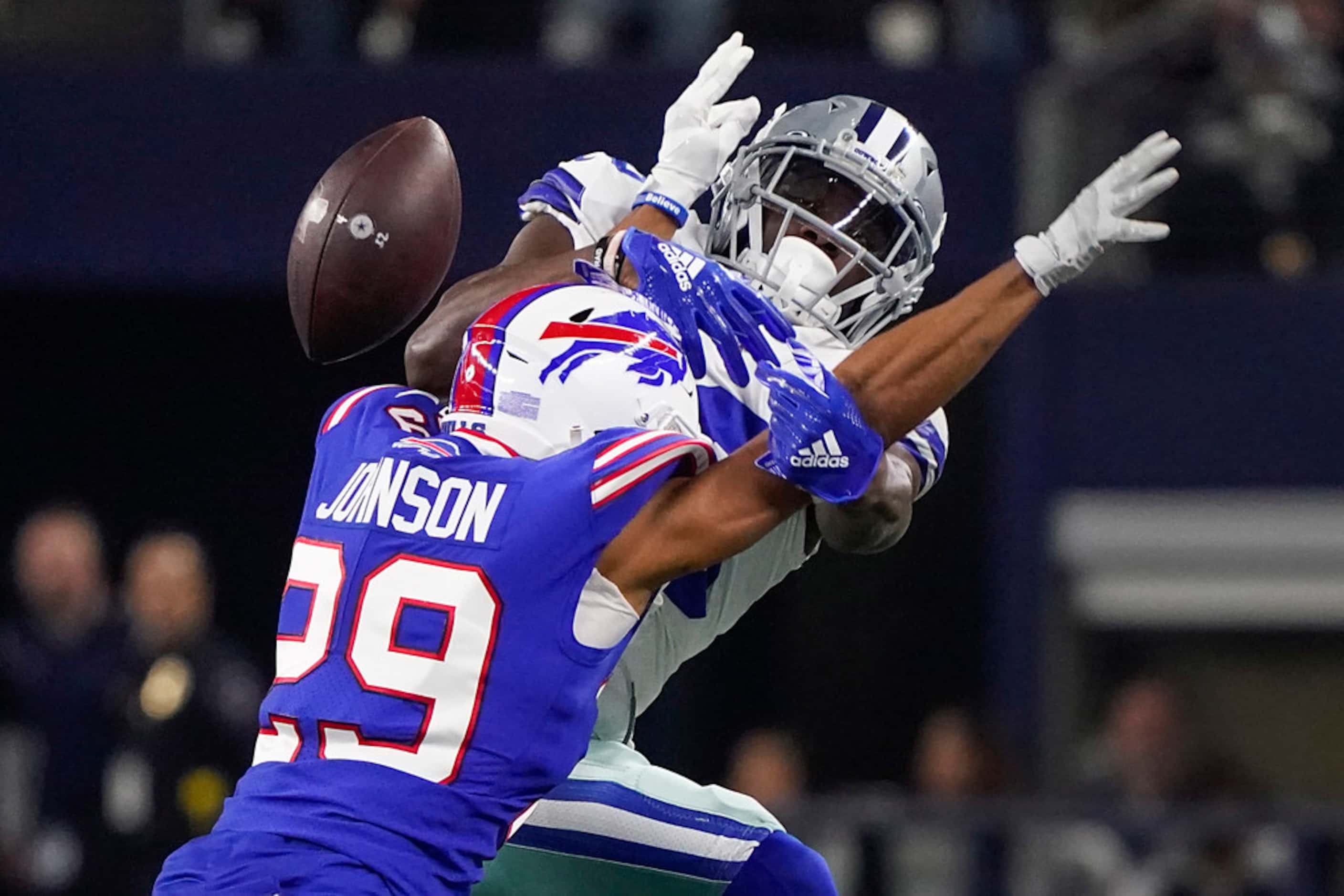 Buffalo Bills cornerback Kevin Johnson (29) breaks up a pass intended for Dallas Cowboys...