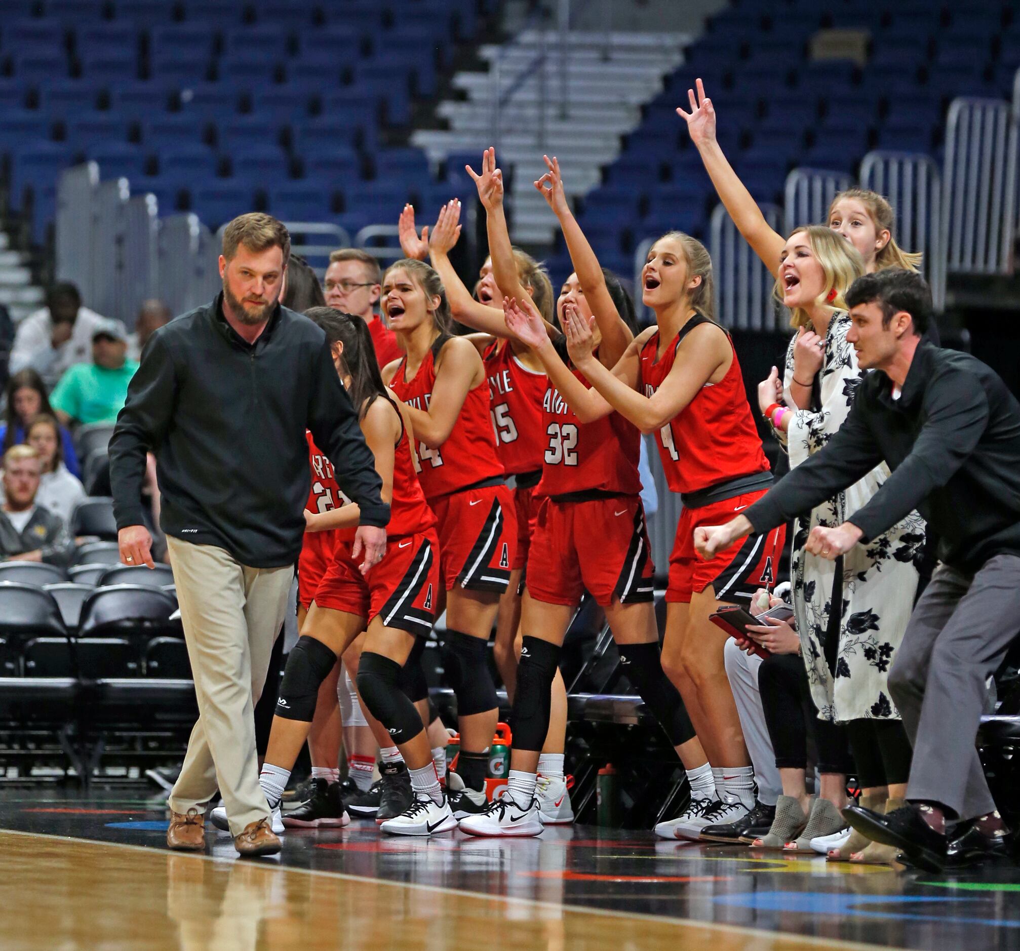 Argyle bench celebrates after a three in a 4A final on Saturday, March 7, 2020 at the...