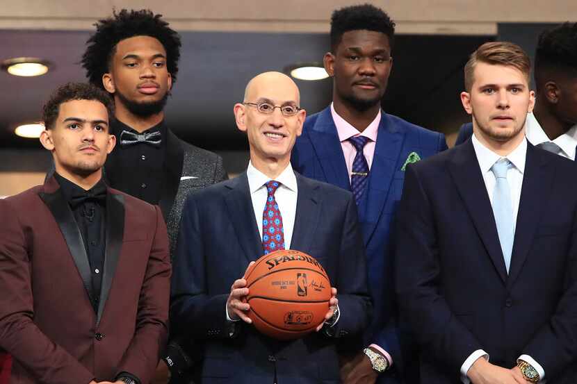 NEW YORK, NY - JUNE 21: NBA Commissioner Adam Silver (C) poses with NBA Draft Prospects Trae...