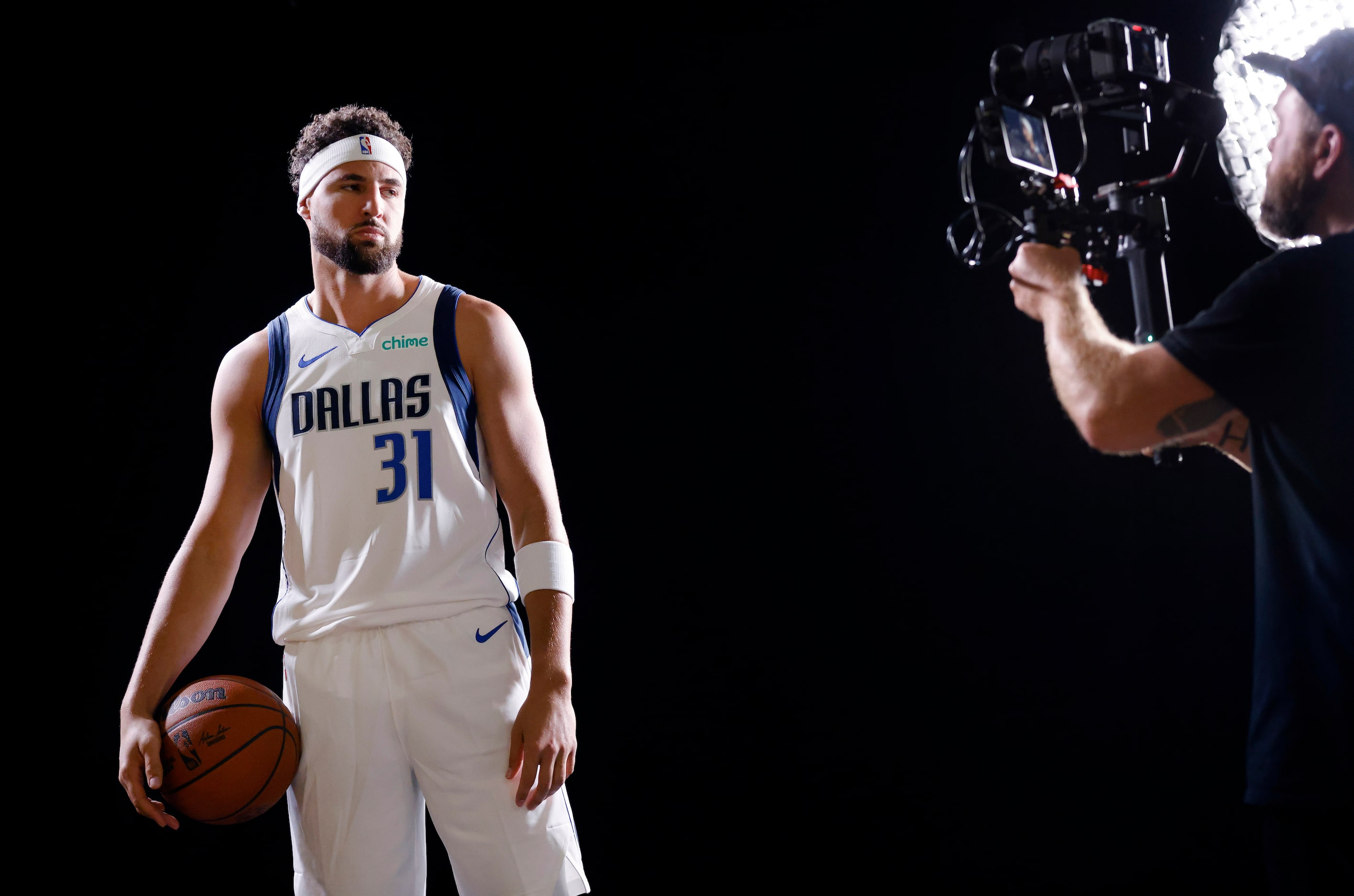 Dallas Mavericks forward Klay Thompson  poses for creative producer Dalton Tarver who rolls...