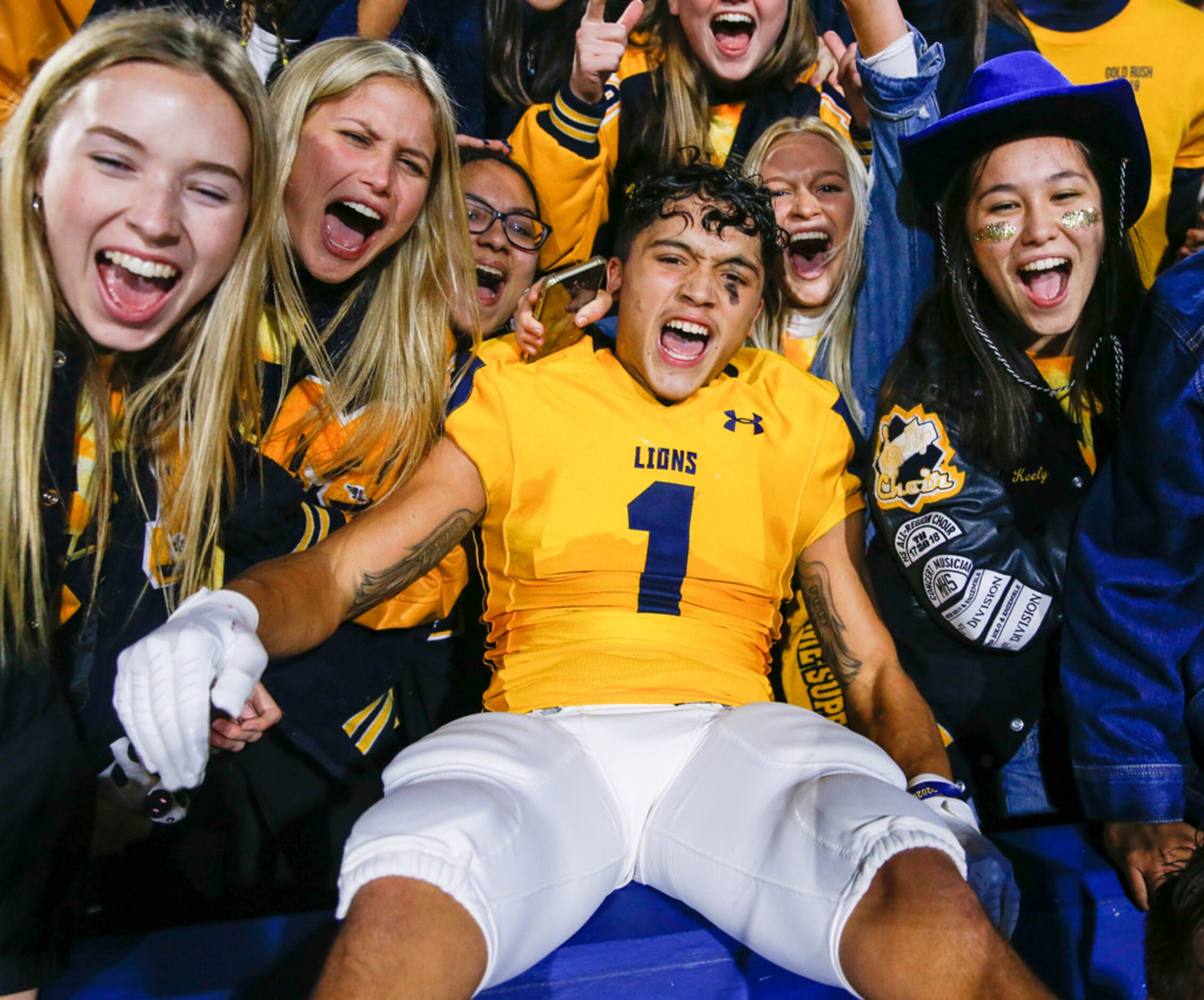 McKinney's Isaiah Rojas (1) celebrates with fans following their win over McKinney Boyd in a...