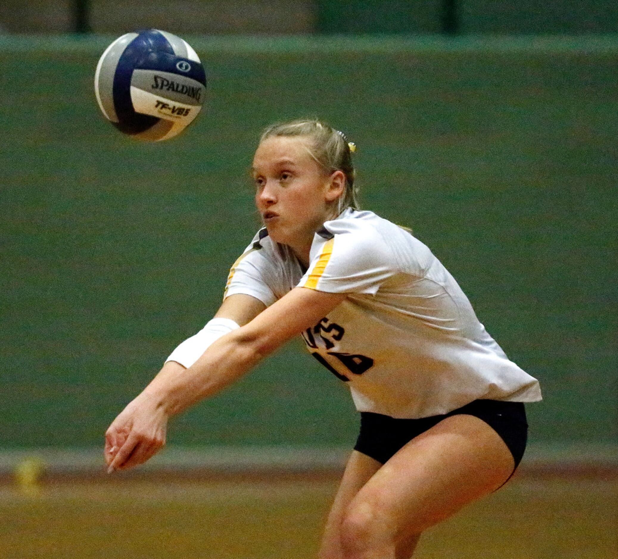 Highland Park High School libber Kennedy Westendorff (16) passes the ball during game two as...