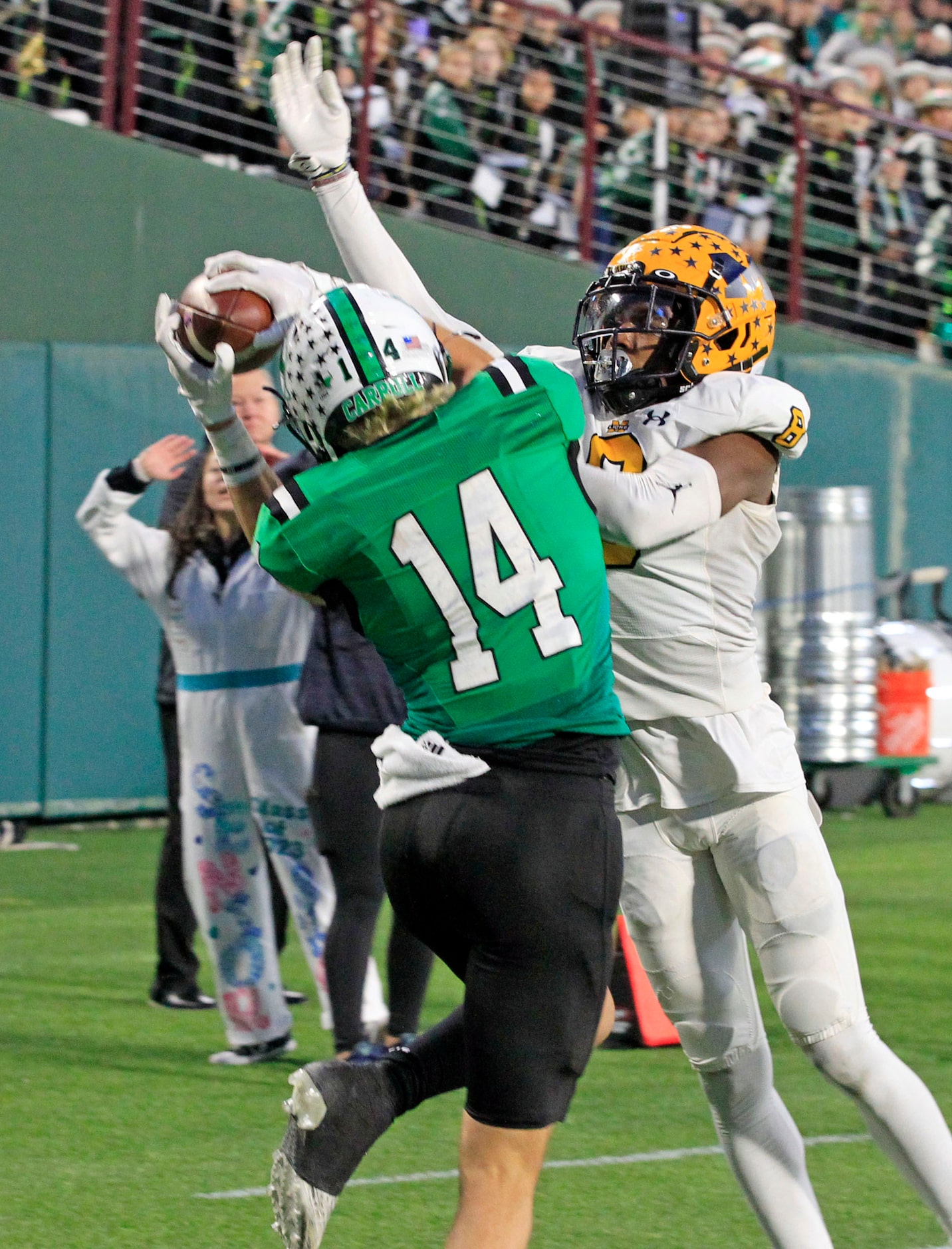 Southlake’s Clayton Wayland (14) fields a touchdown pass, as McKinney defender Ashton...