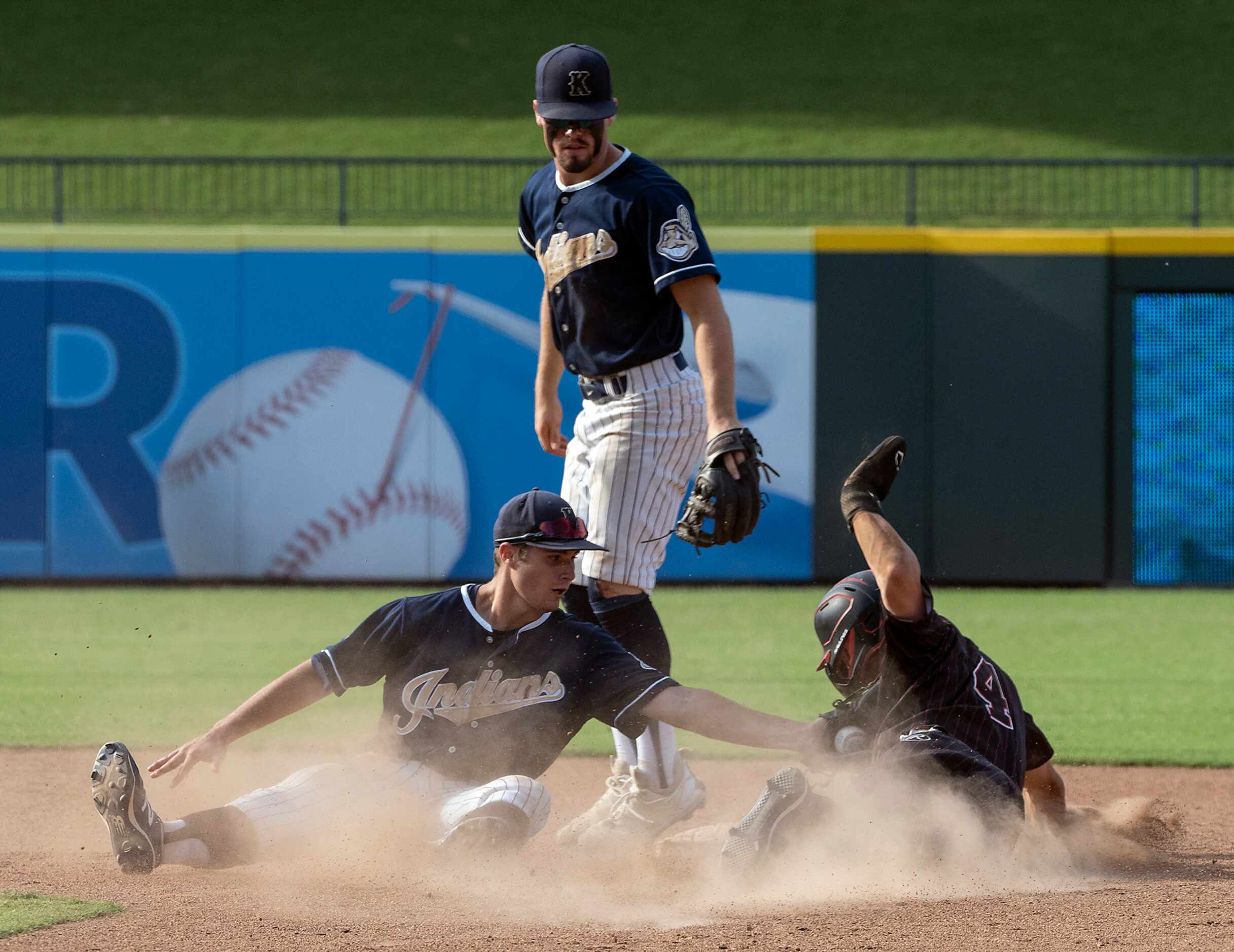 Rockwall-Heath Jett Williams, (4), is tagged out at second base by Keller Todd Baffa, (2),...