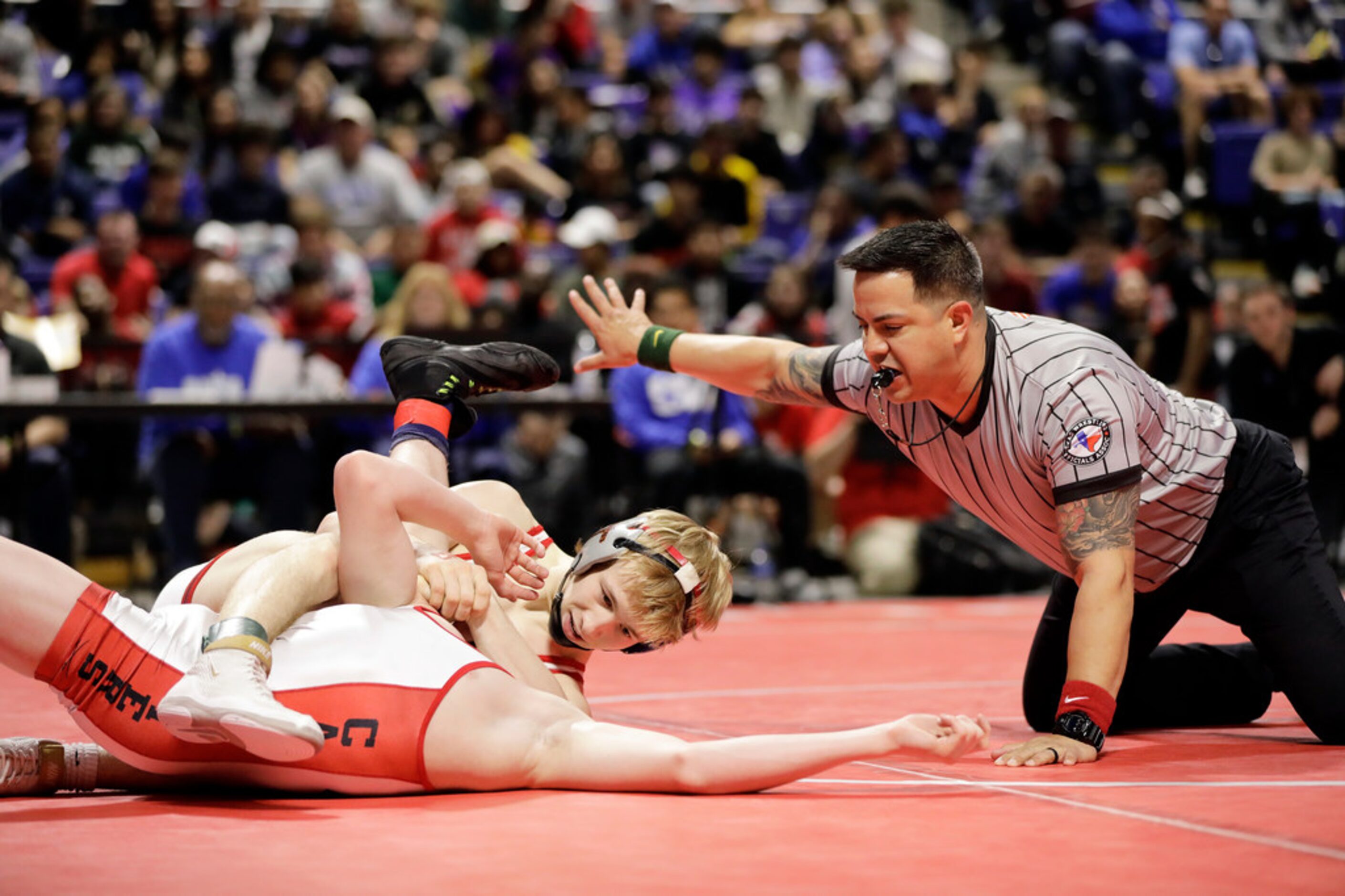 Braxton Brown of Allen wrestles during the UIL Texas State Wrestling Championships,...