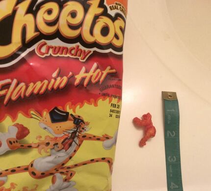 An image from an eBay post details the Harambe-shaped Cheeto.