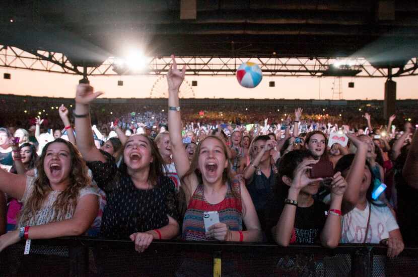 Teenage girls scream for  One Direction at Gexa Energy Pavilion on Saturday, June 23, 2012. 