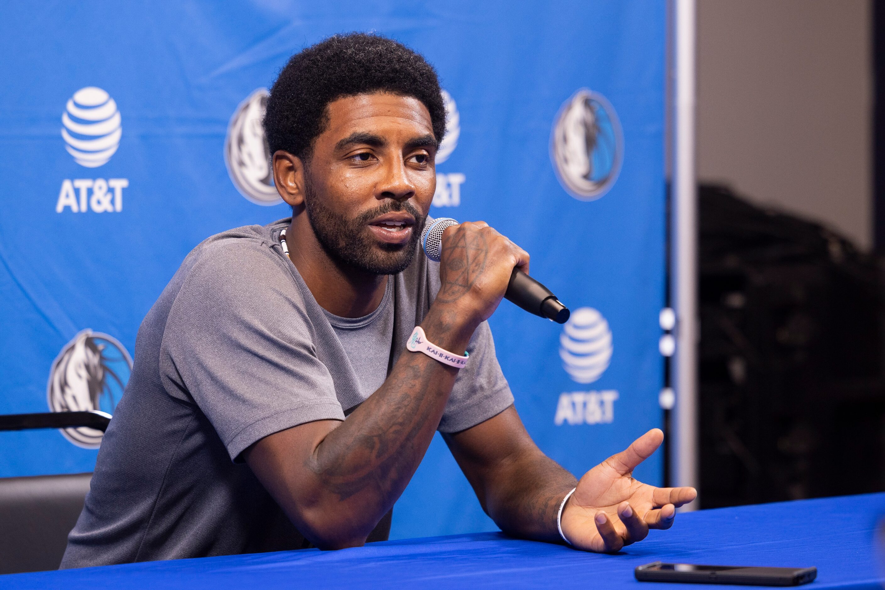 Dallas Mavericks guard Kyrie Irving (11) speaks to reporters at the Mavericks Training...