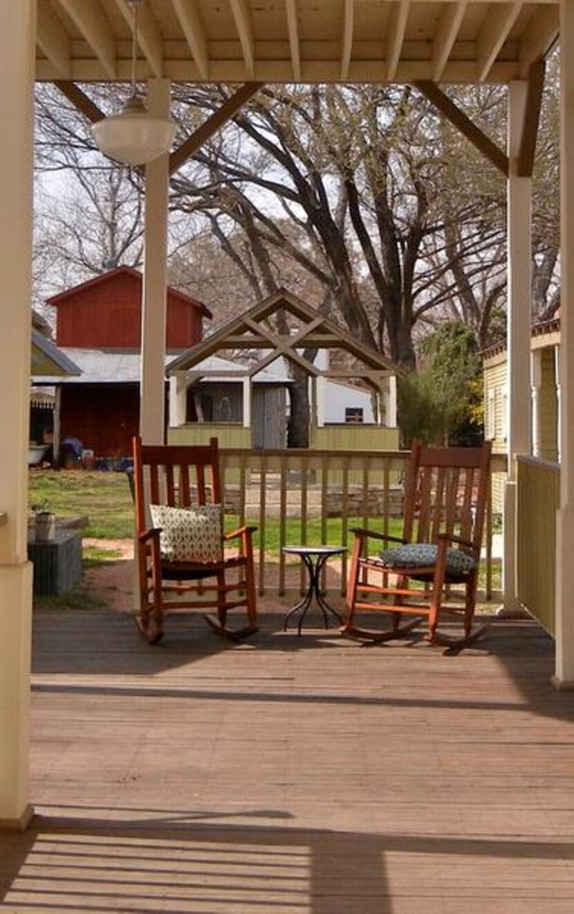 
Guests often choose to knit or read on the sunny back porch at Hotel Faust in Comfort.
