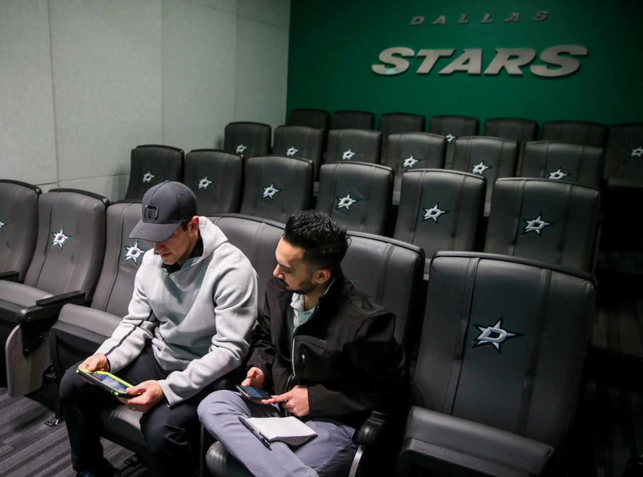 Dallas Stars defender Taylor Fedun, left, goes over film with The Dallas Morning News writer...