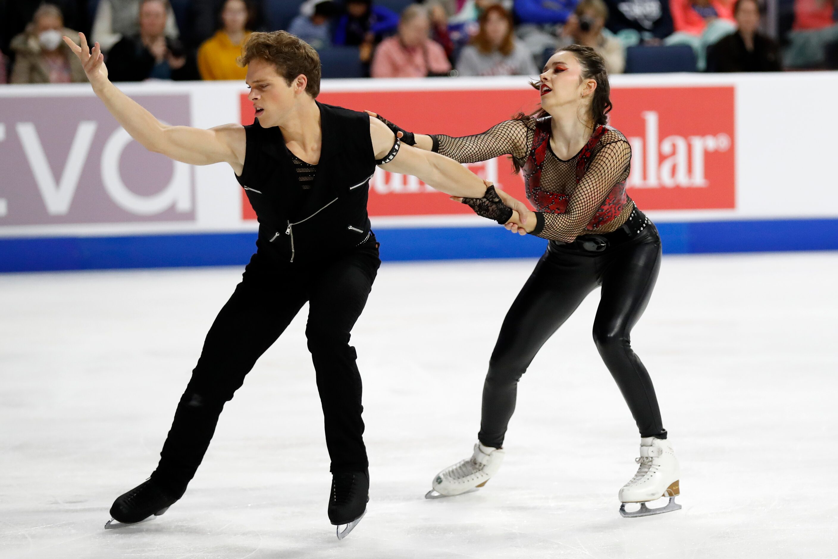 Caroline Green, right, and Michael Parsons, left, of the United States, compete in the ice...